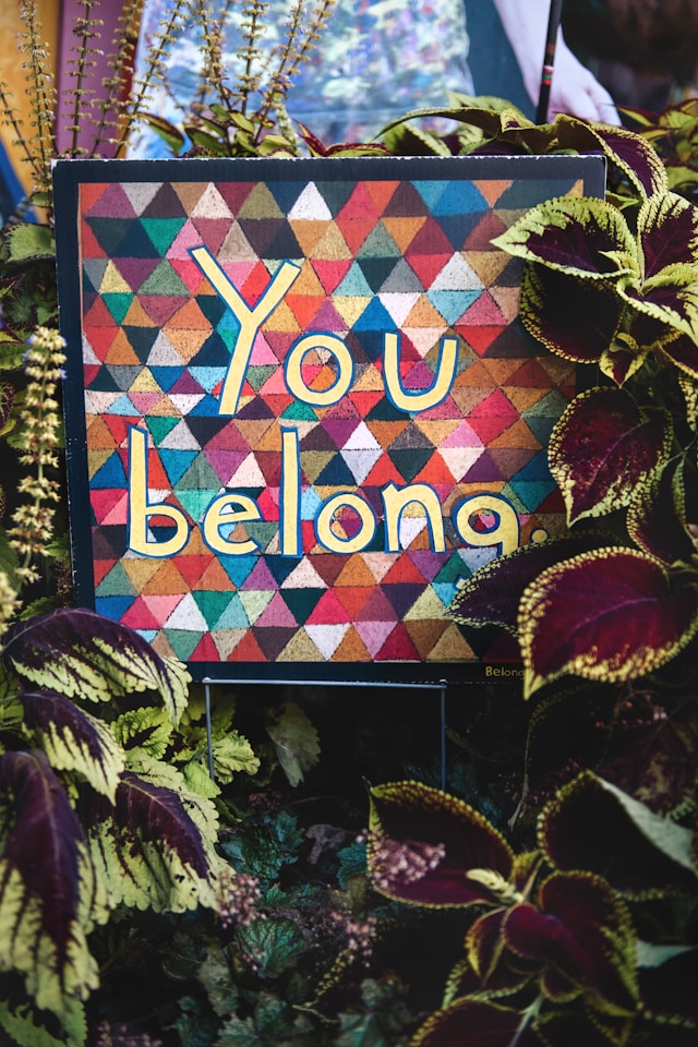 A sign that reads "You belong".